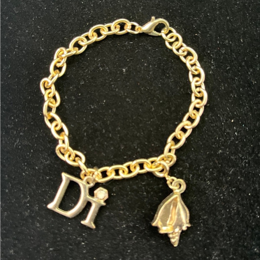 Diamond International Gold Color Charm Necklace 7 1/4”